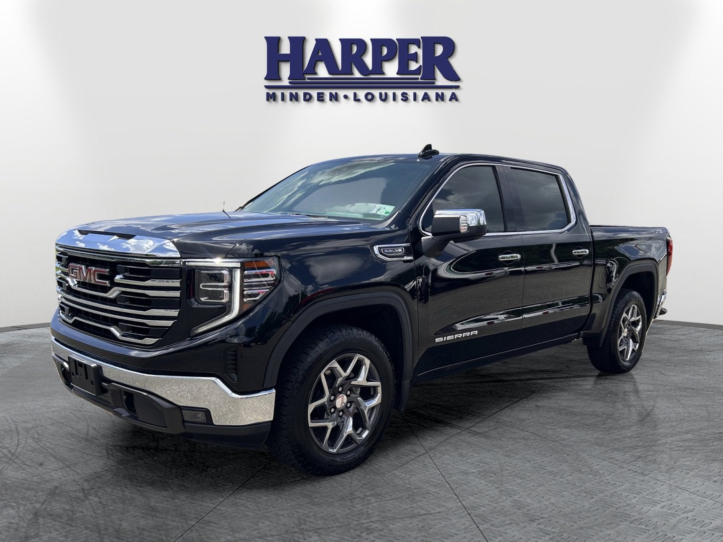 2023 GMC Sierra 1500 SLT in Onyx Black — front three-quarter view
