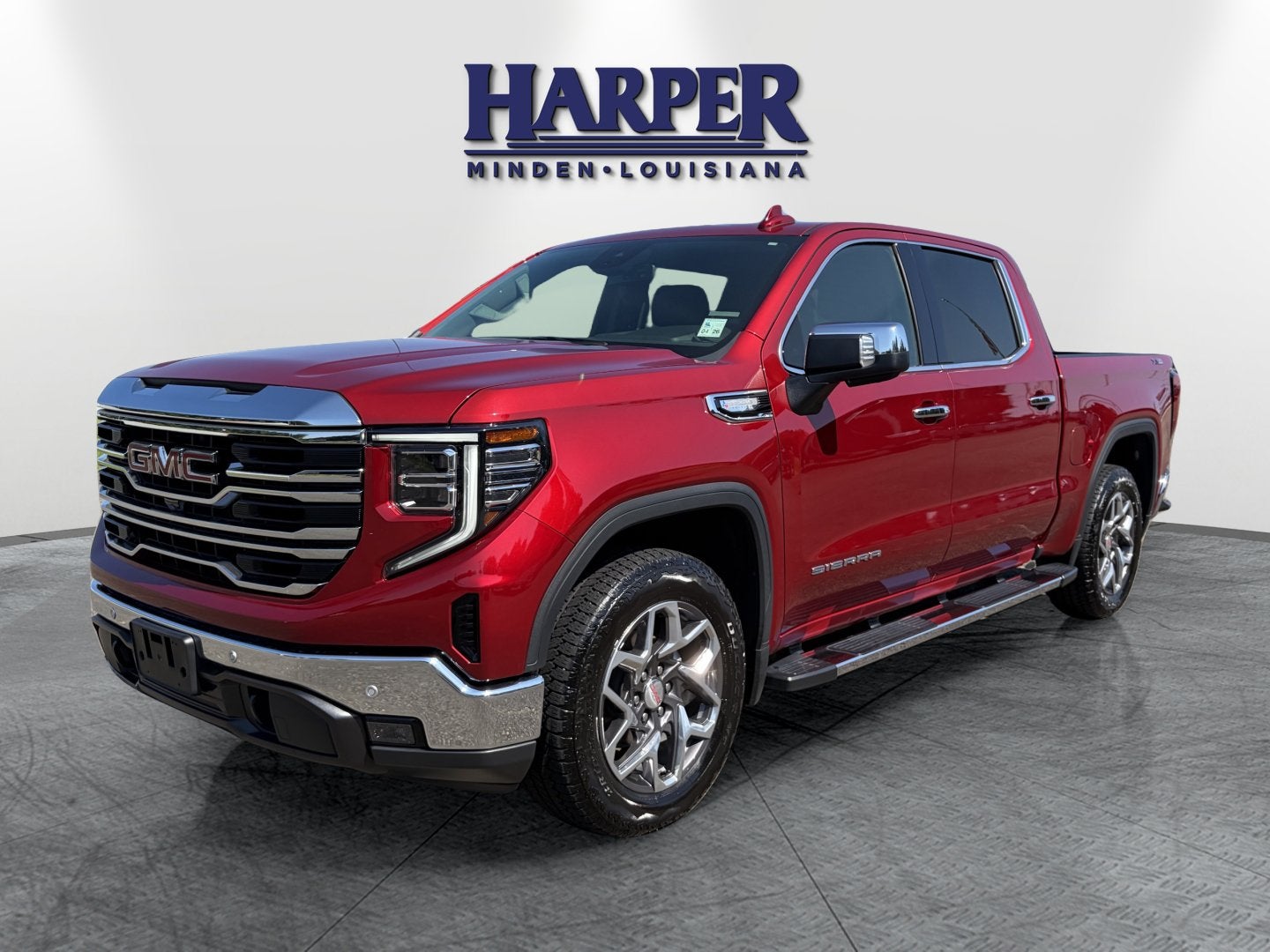 2024 GMC Sierra 1500 SLT in Volcanic Red Tintcoat — front three-quarter view